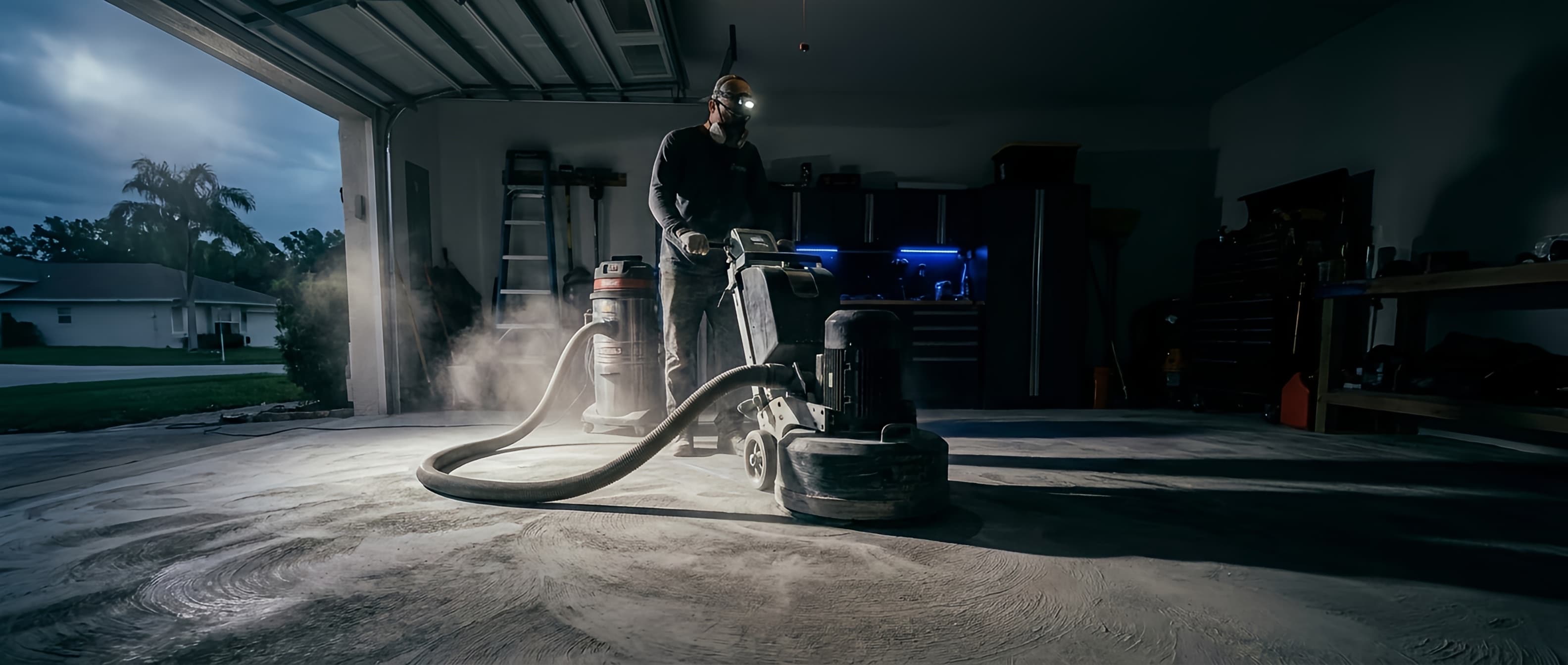 Diamond grinding a bare concrete slab before coating